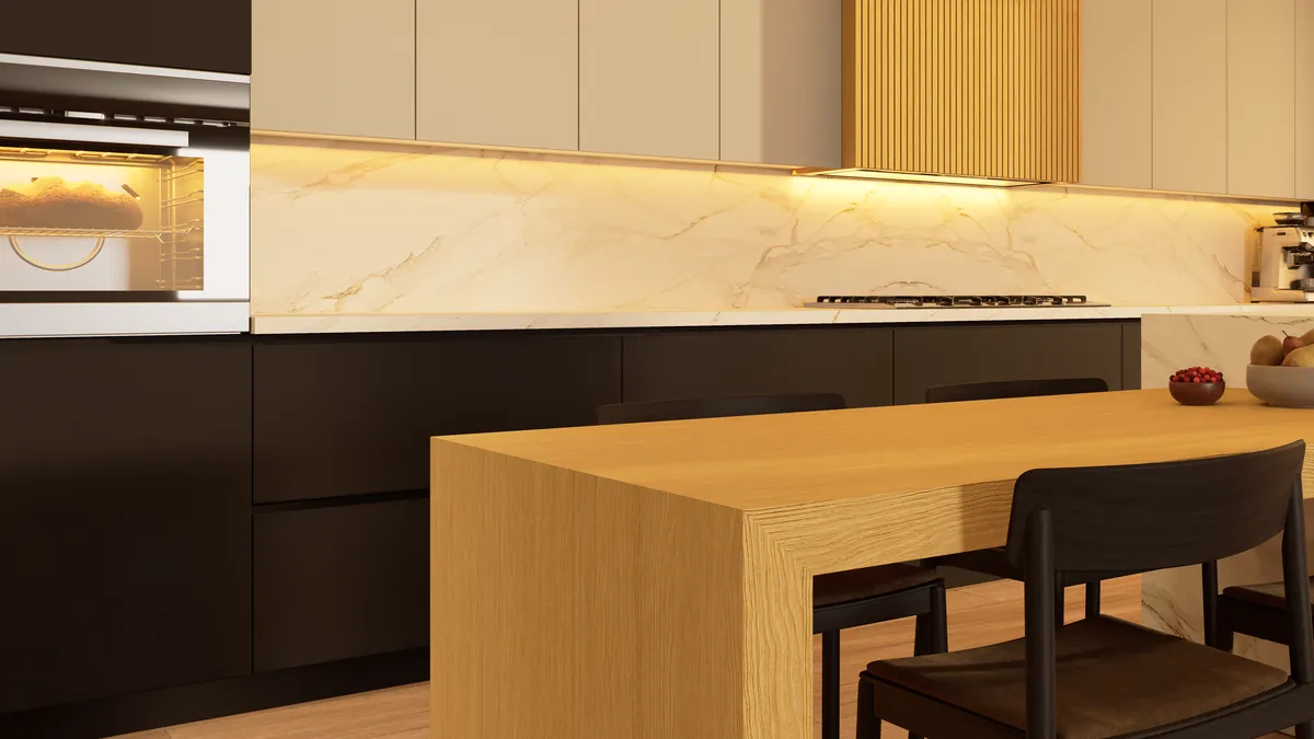 Close-up of the mitered white oak table meeting the island