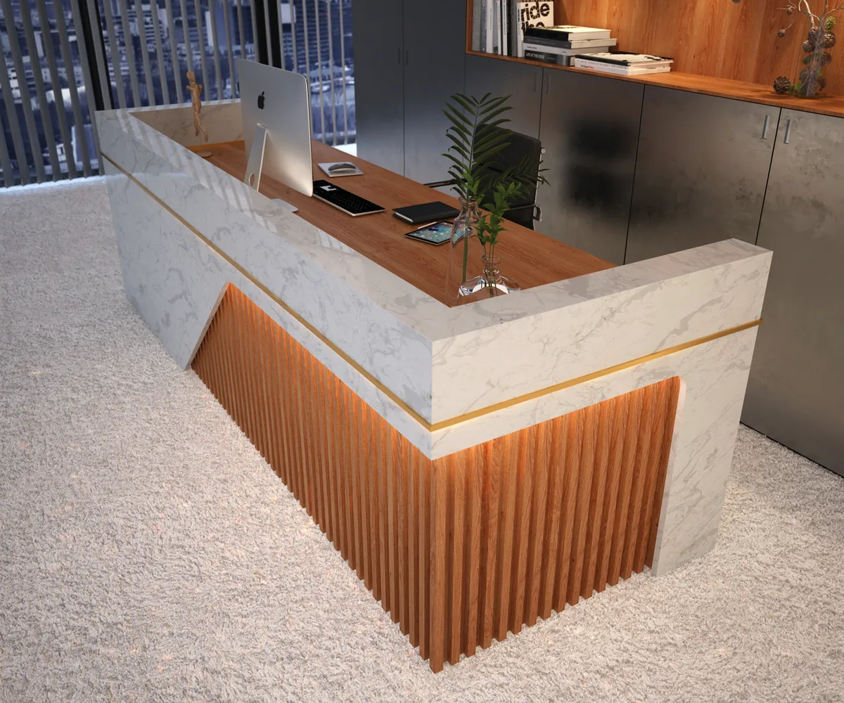 High angle of the L-shaped reception desk showing the oak top and fluted base