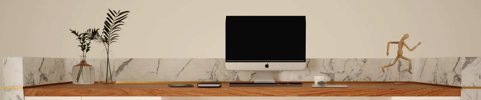 Front view of the reception desk work surface: oak top, marble upstand with brass trim, monitor and accessories